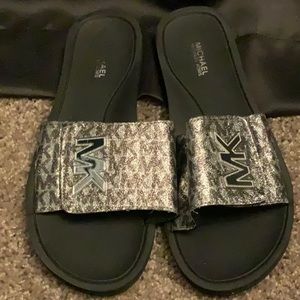 Gently worn micheal kors slides